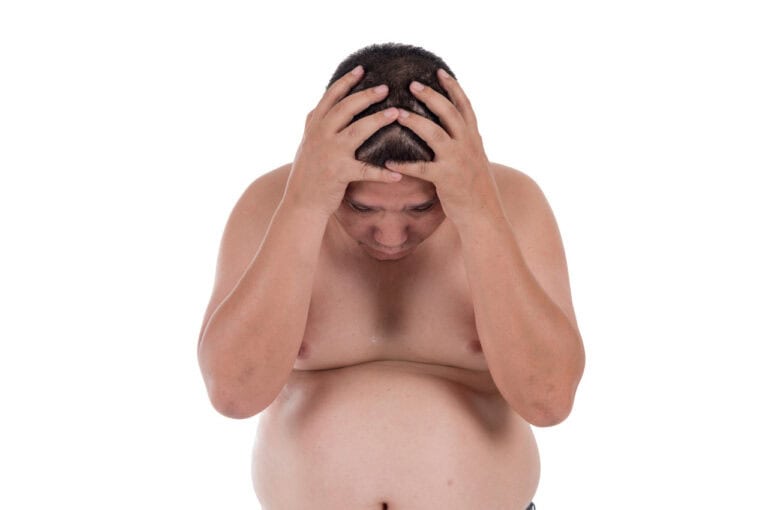 Man worrying because of gynecomastia