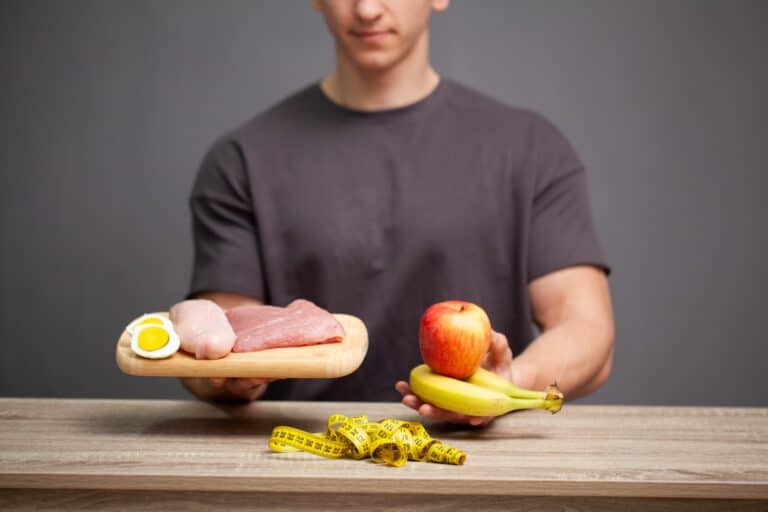 man holding high protein diet for after gynecomastia surgery charlotte