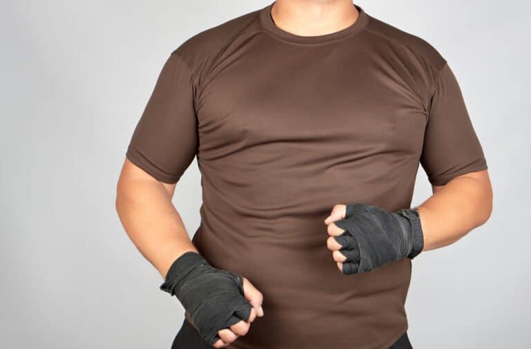 fat man wearing brown compression shirts